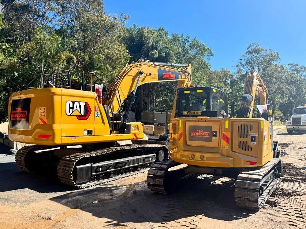 Two Excavators on Construction Site Two Excavators on Construction Site