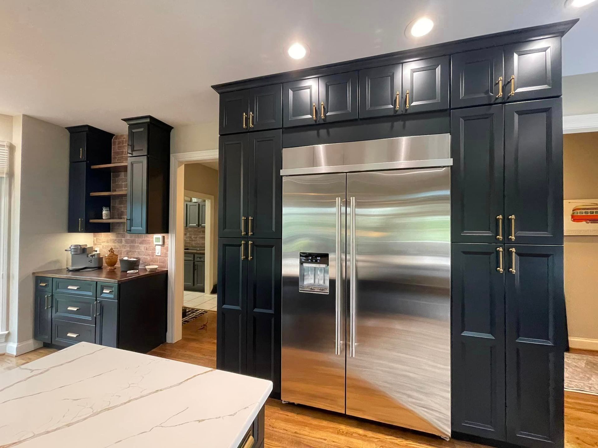 dark blue kitchen view 7 with stainless steel refrigerator