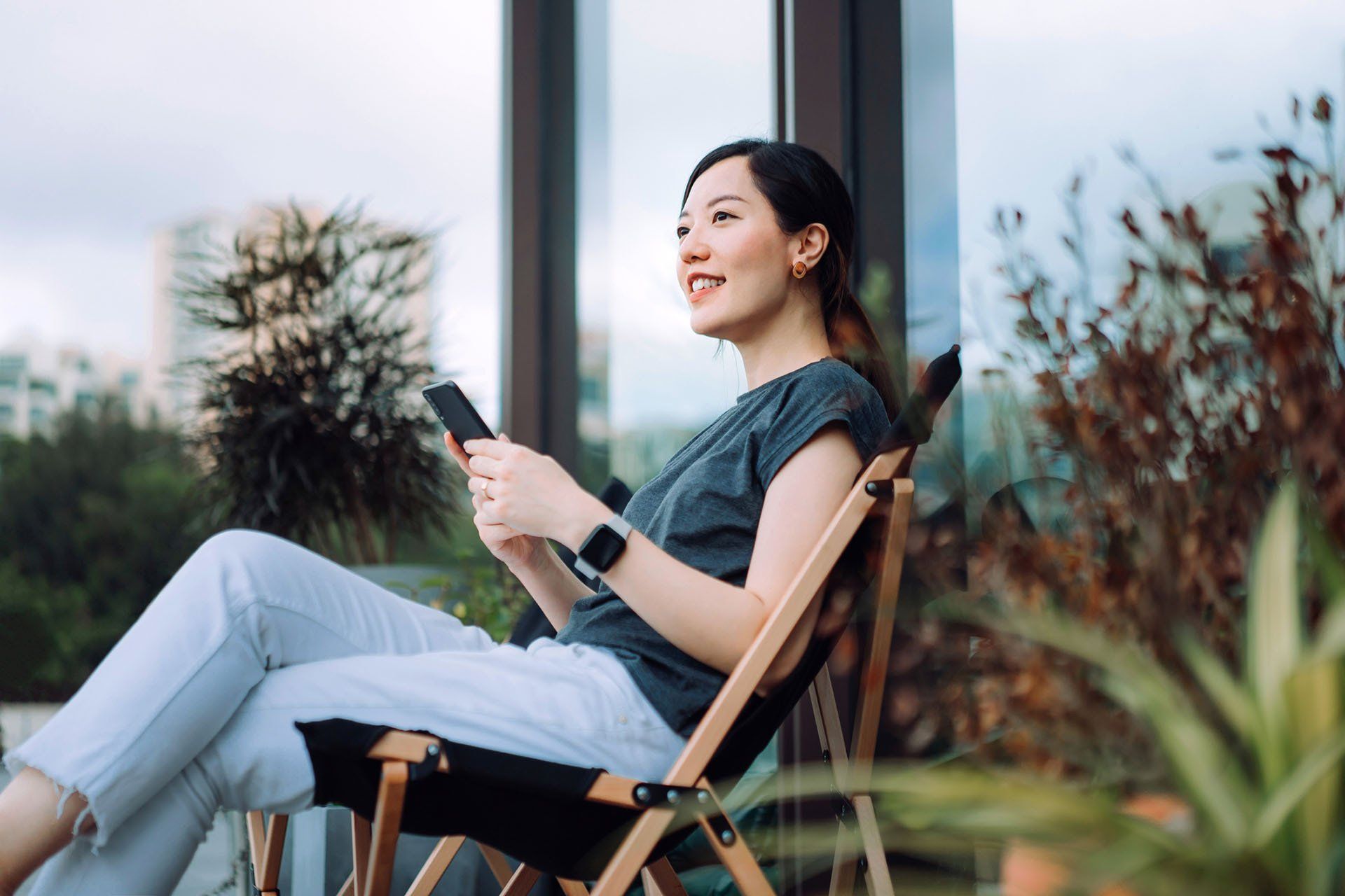 Woman Using Phone — Shelby Township, MI — Dermatology Specialists of Shelby Township Woman Using Phone — Shelby Township, MI — Dermatology Specialists of Shelby Township