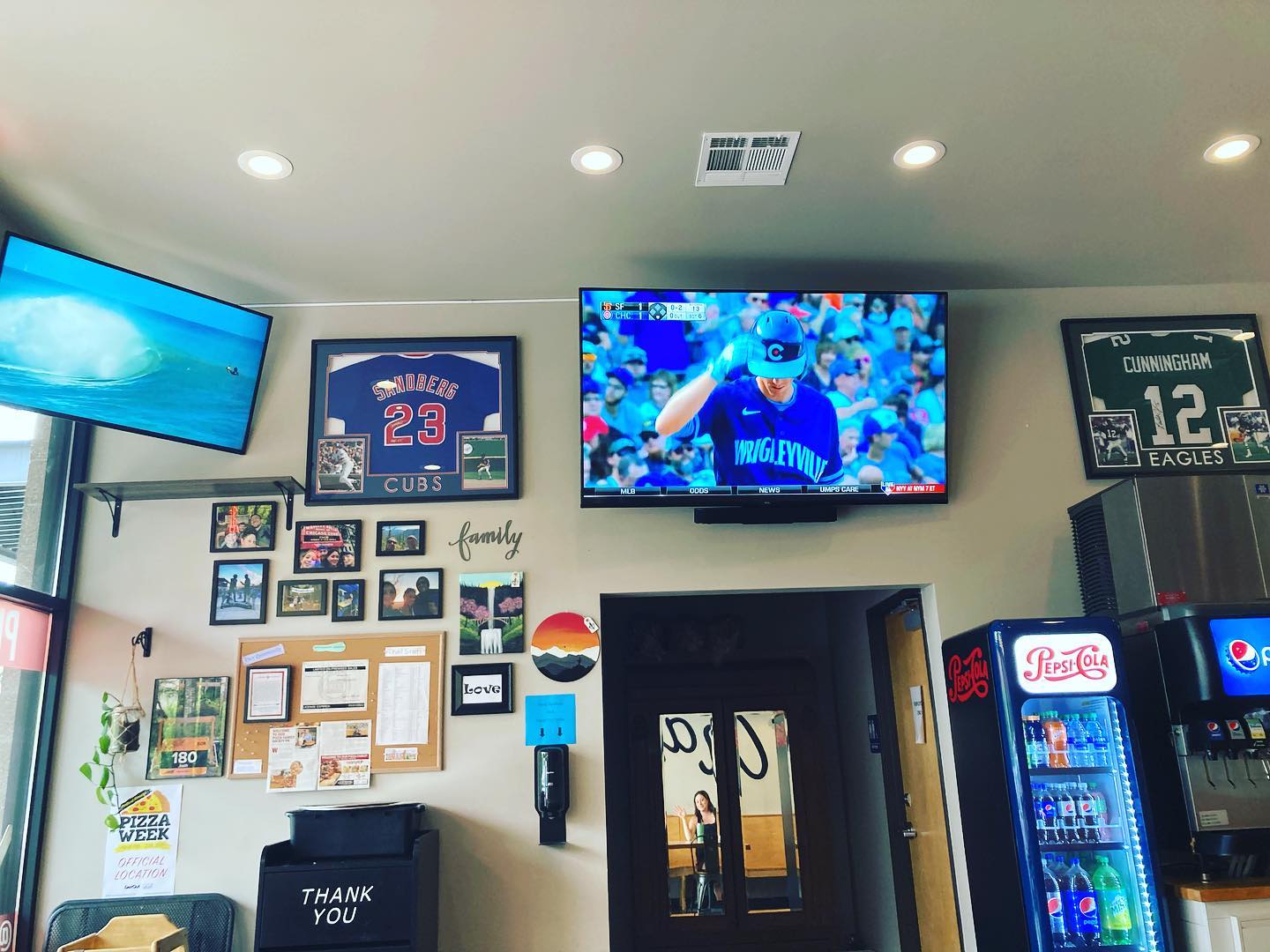 TV hanging on the wall.