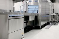 A Dishwasher is Open and Ready to Be Used in a Kitchen — Commercial Kitchens Direct in Unanderra, NSW