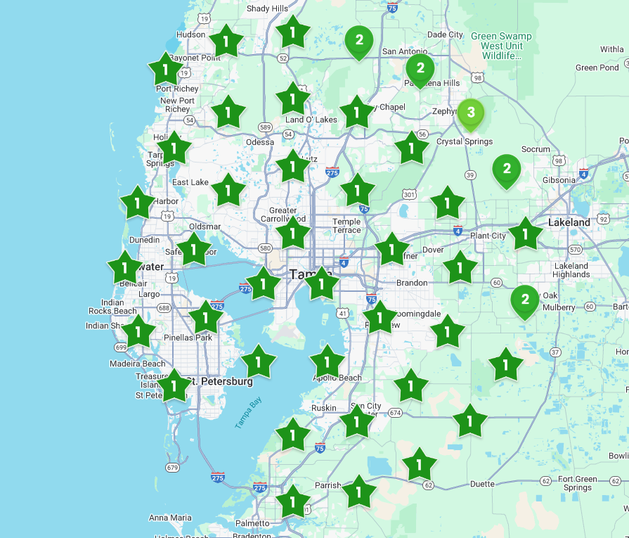 A map of a city with green stars on it.