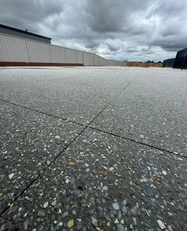 Charcoal exposed aggregate mix for exposed aggregate driveway.