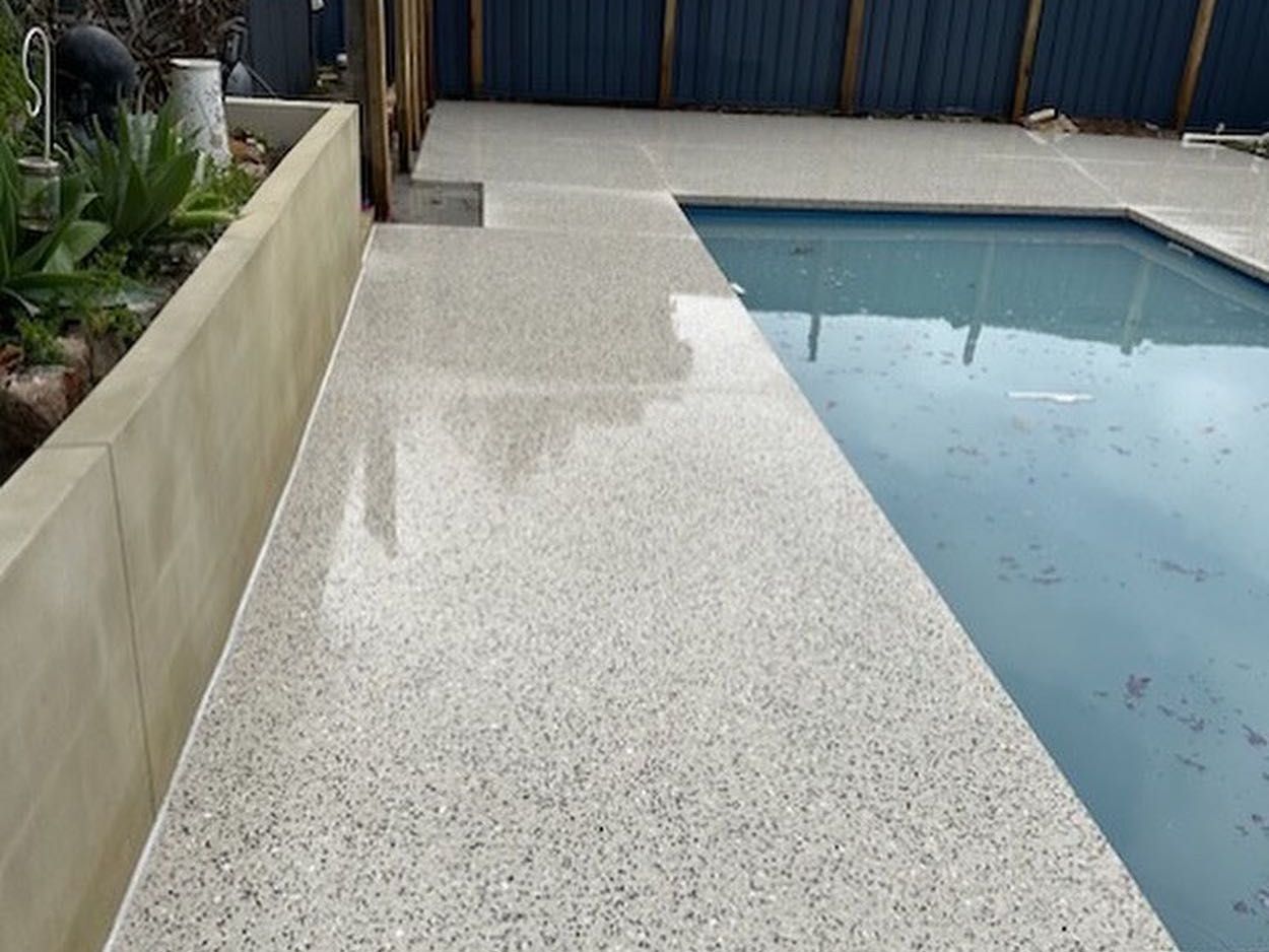 Honed Concrete Pool Area in Perth Backyard