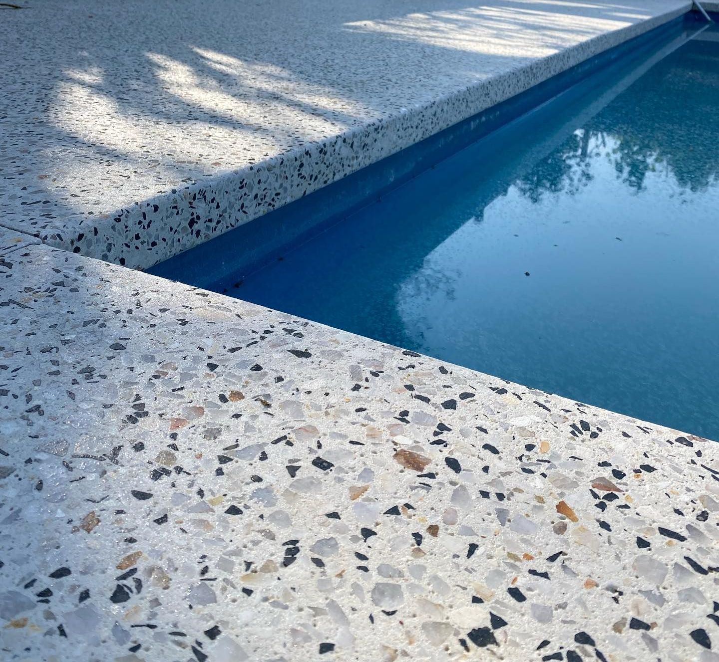 Honed Exposed Aggregate Concrete Pool Surrounds in Perth with Concrete Bull Nosing laid by Handmade Concreting Concreters