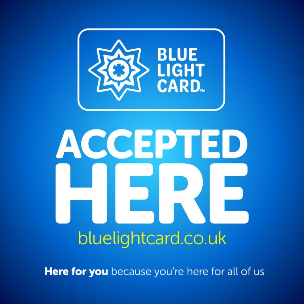 A blue sign states that the Blue Light Card is accepted here, with the website bluelightcard.co.uk and a slogan below.