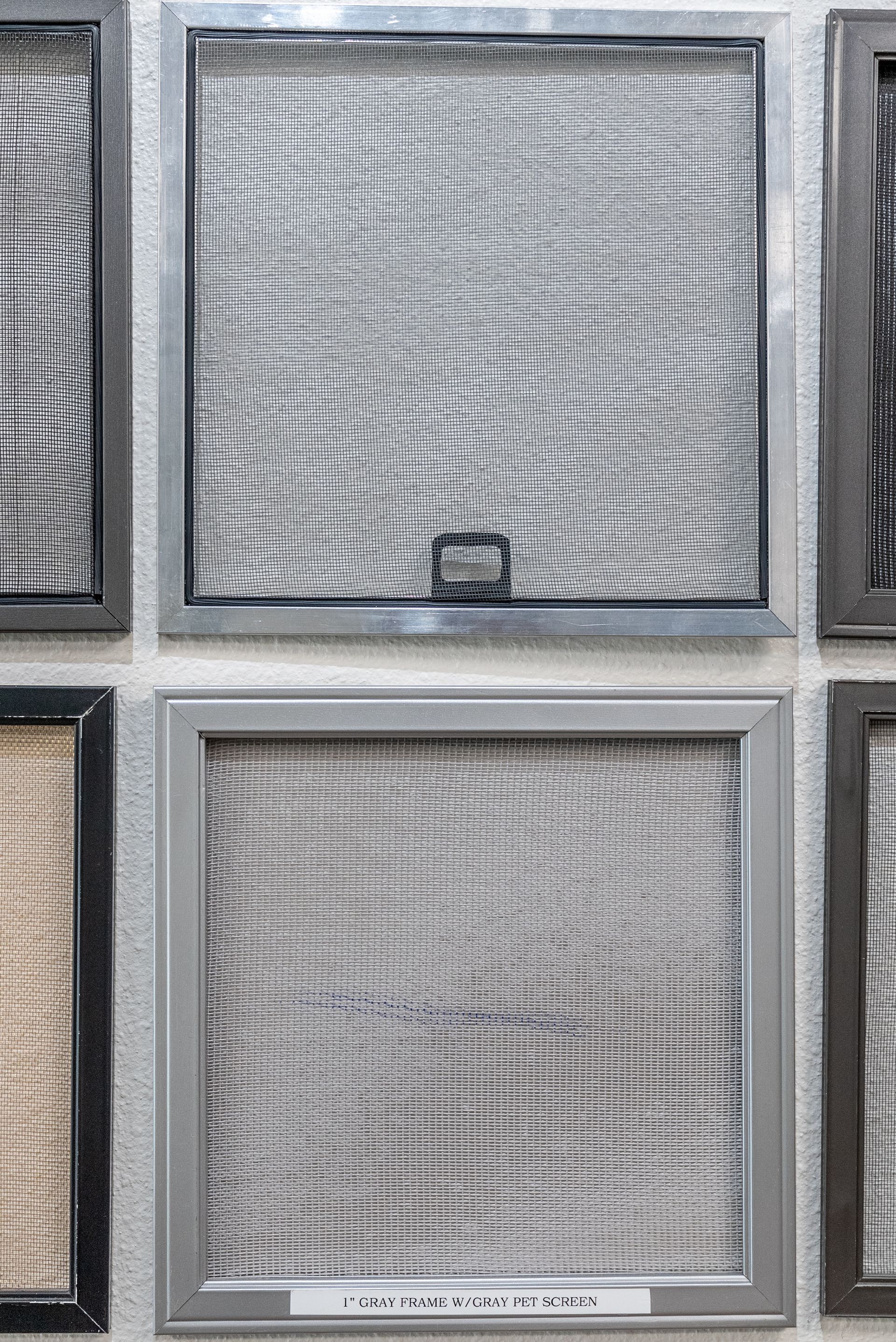 Close-up of air filters in metal frames, showing wavy, mesh material.