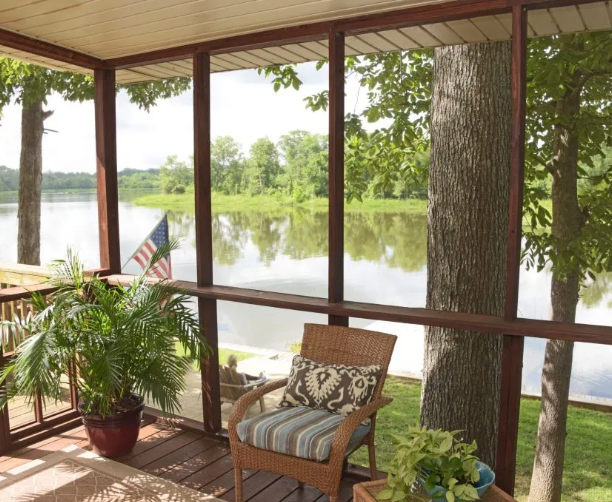 French doors open onto a patio, with a retractable screen.