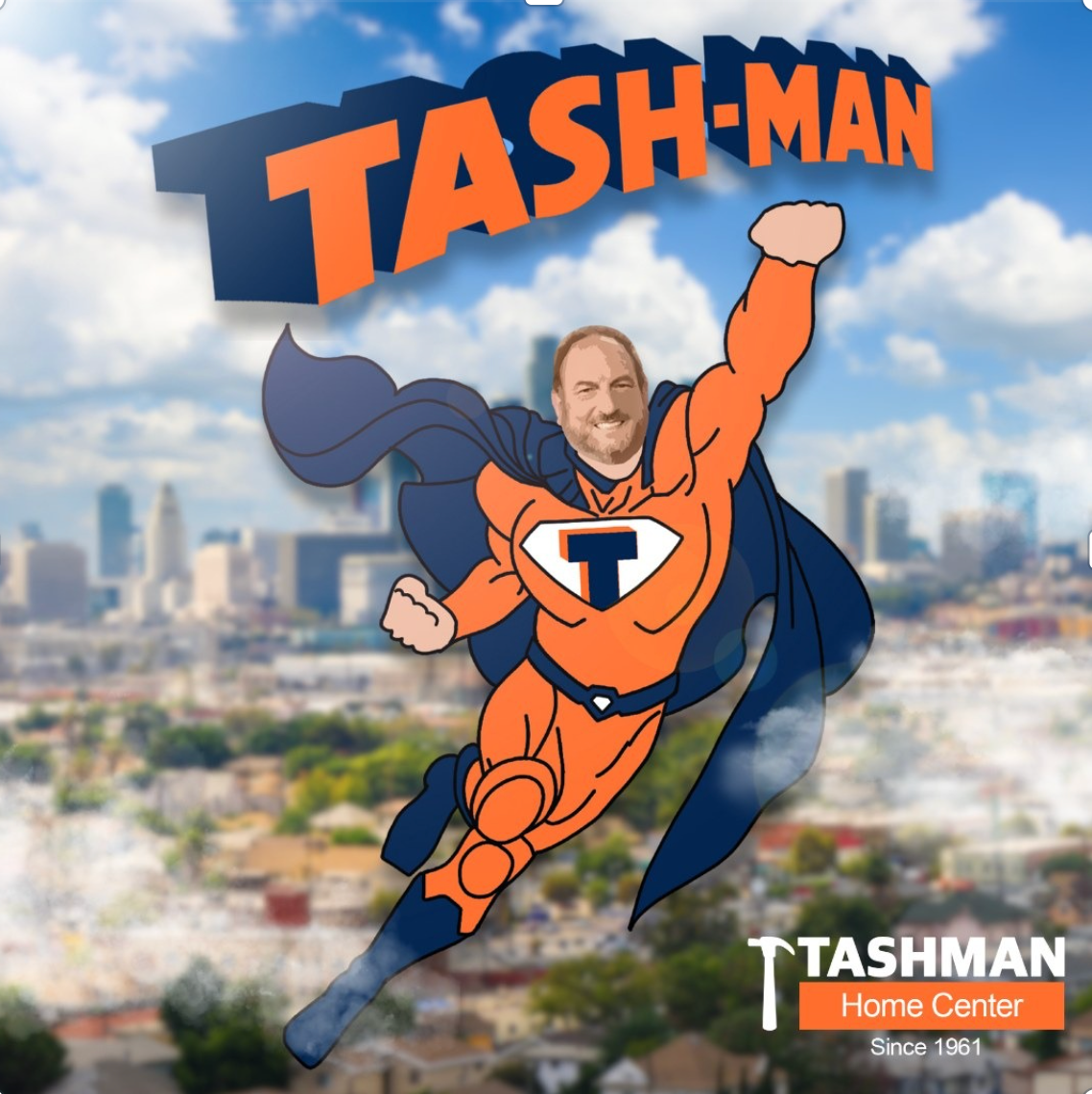 Tash-Man superhero flying over a city skyline. Orange and blue suit. Tashman Home Center logo.