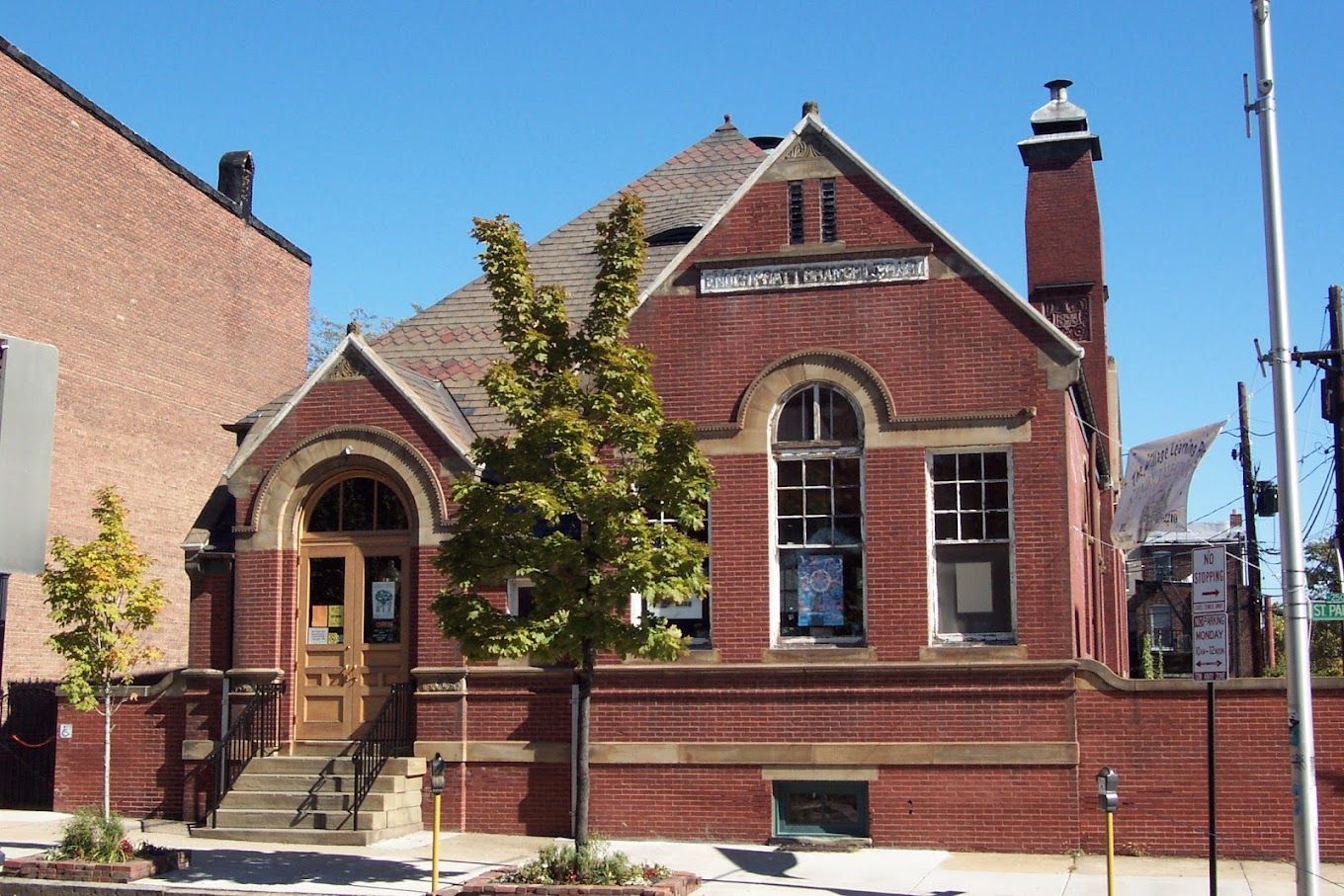 A brick building with a chimney on top of it