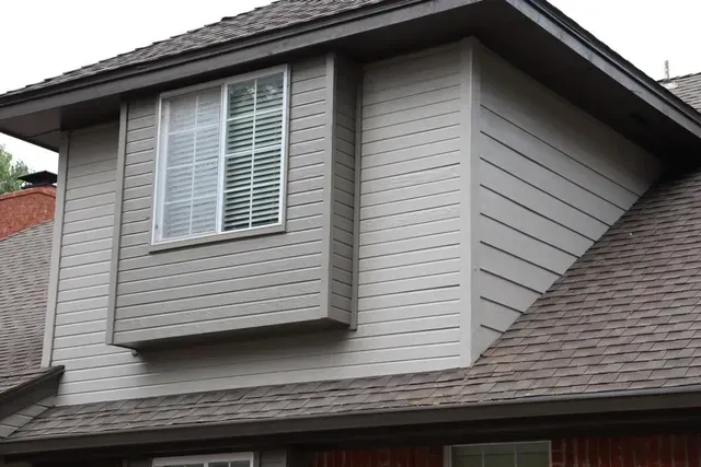 A house with a window on the side of it