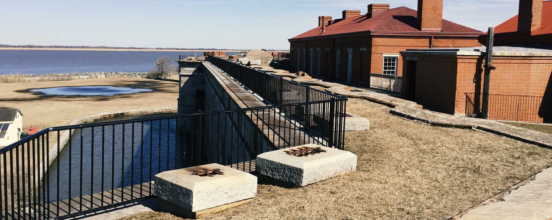 metal railings in a building overlooking an ocean
