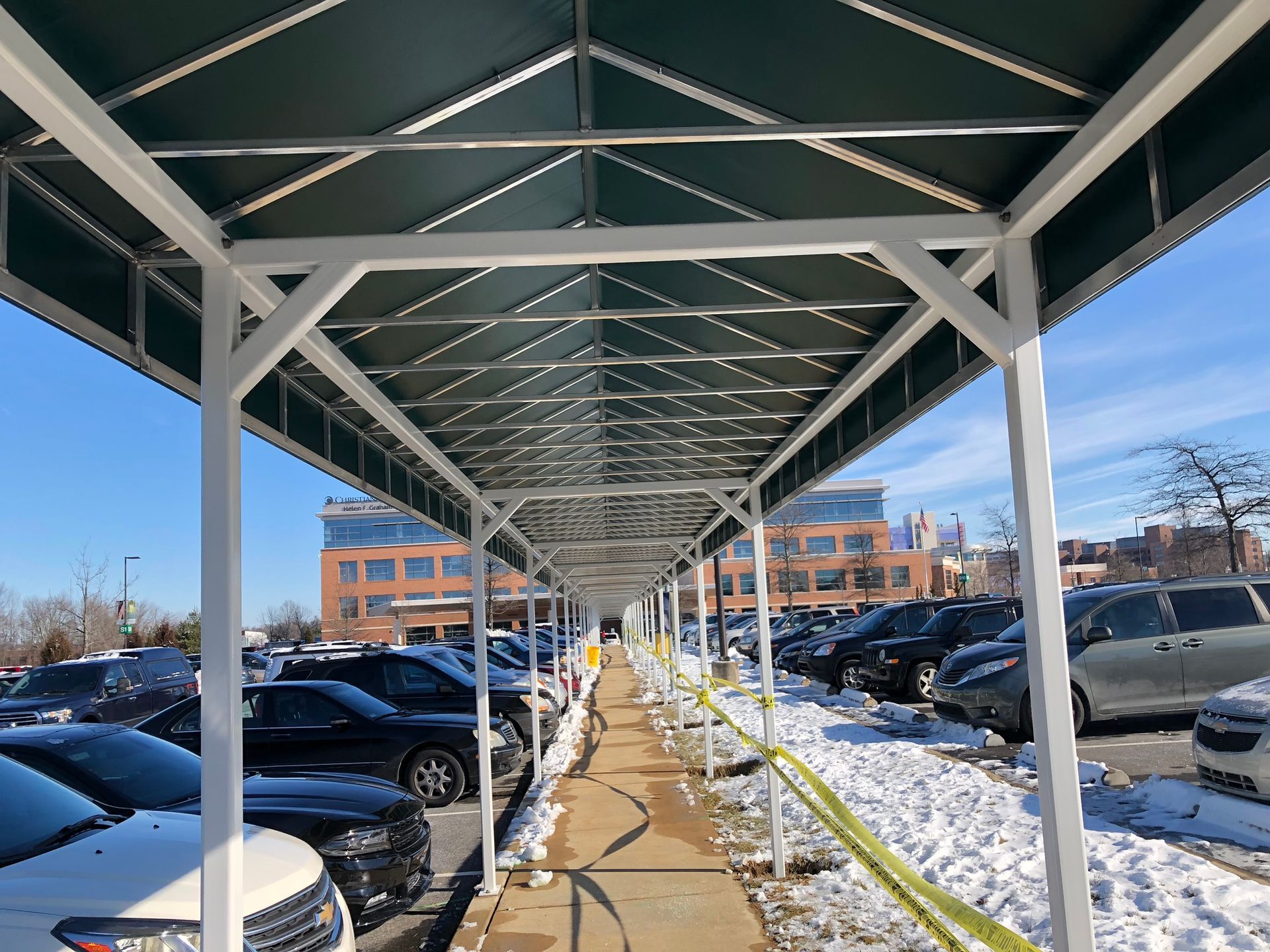 320 ft. awning at a parking lot sidewalk
