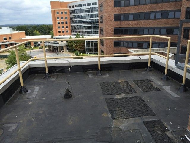 metal railing at a building rooftop