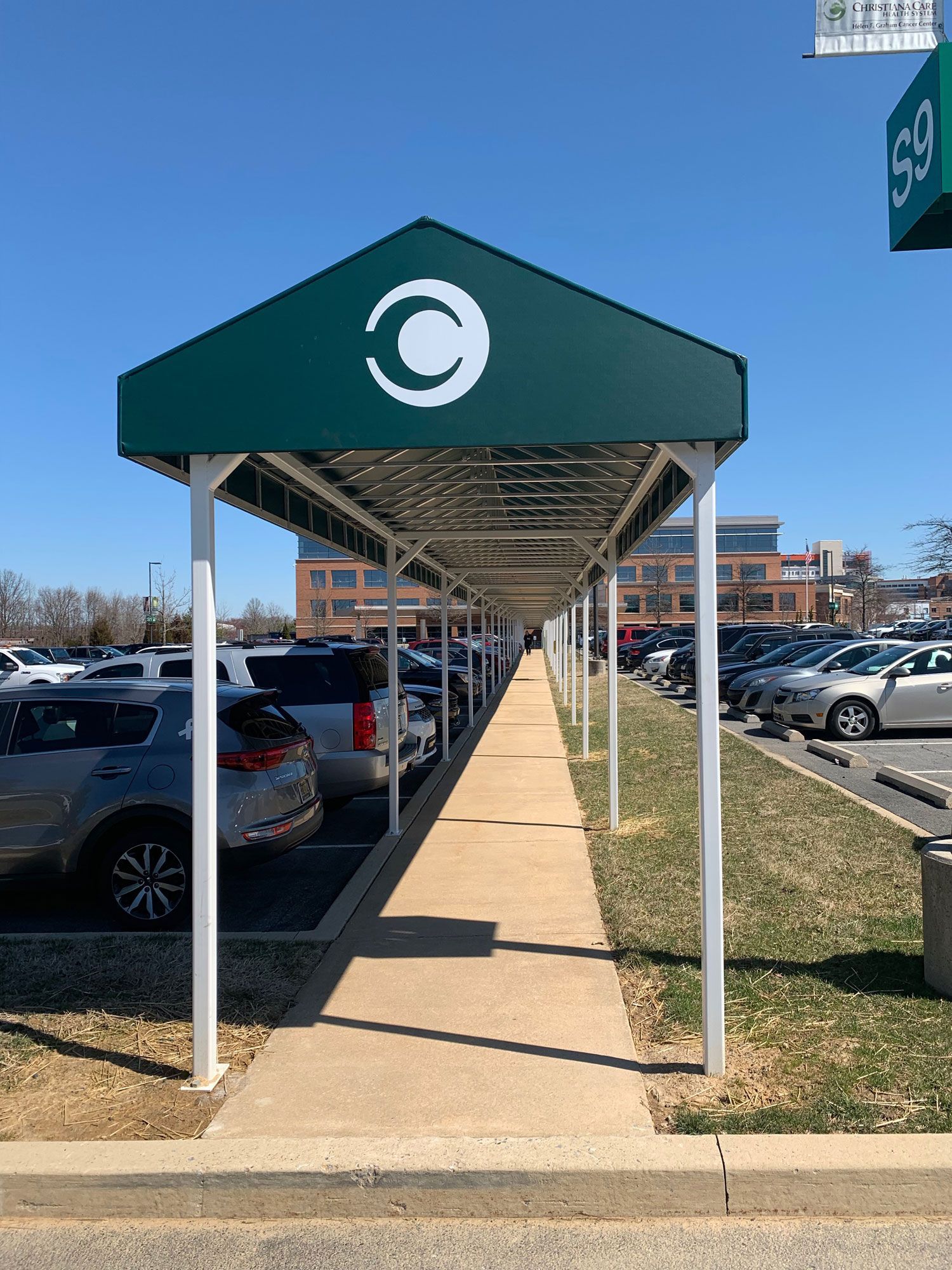 320 ft. awning at a parking lot sidewalk