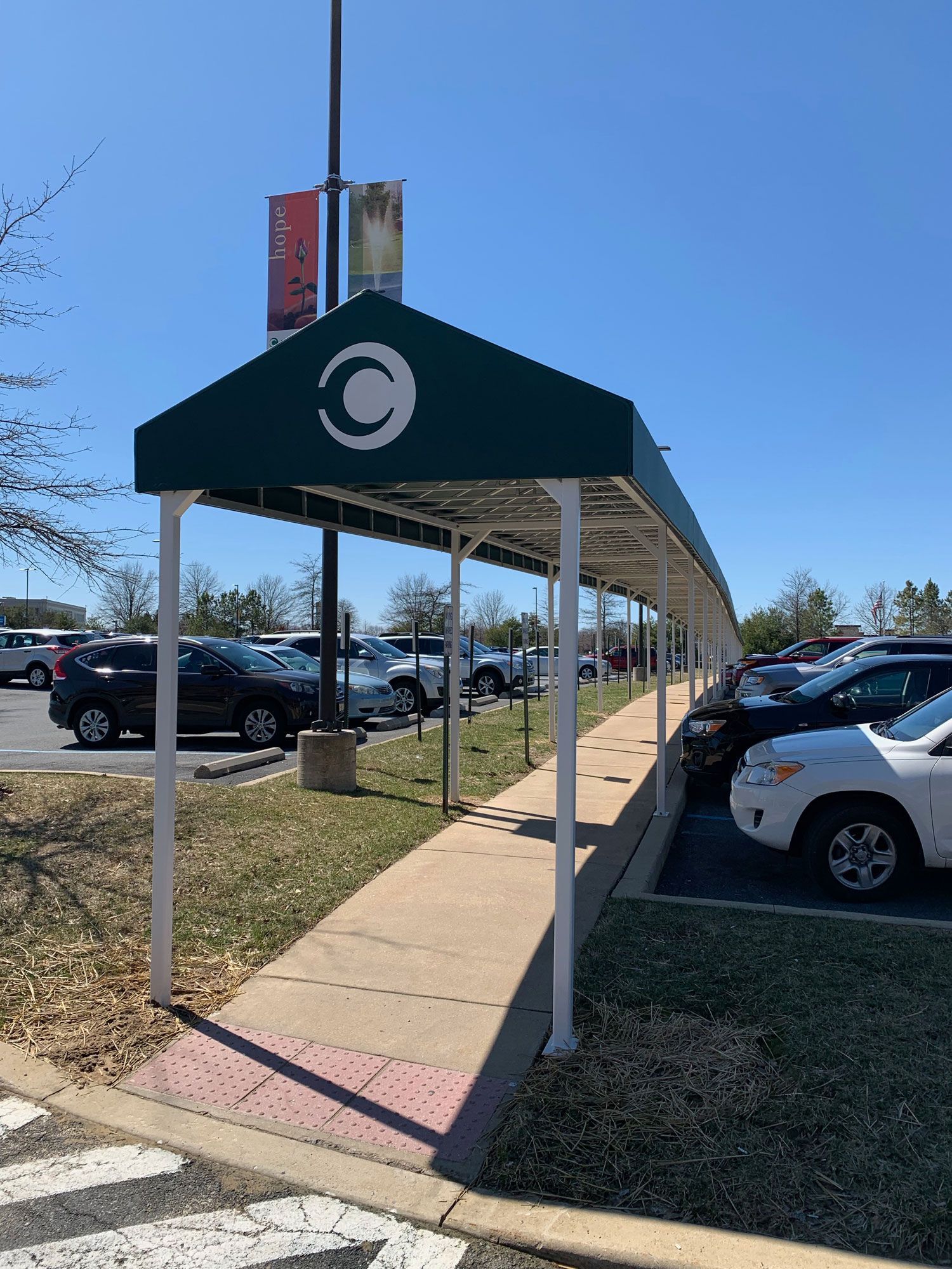 320 ft. awning at a parking lot sidewalk