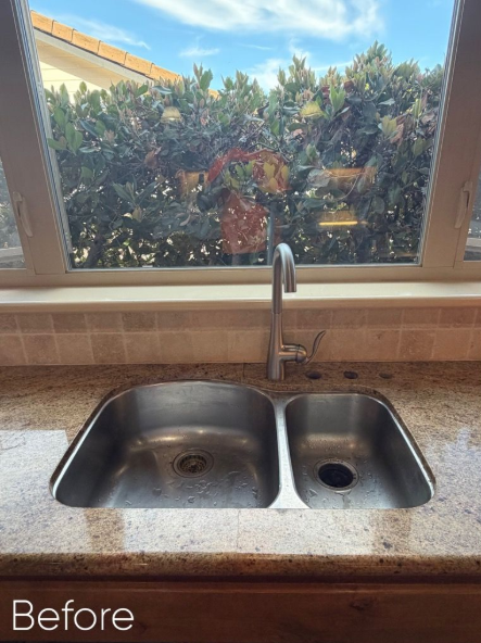Kitchen sink under a window with plants outside, labeled “Before”