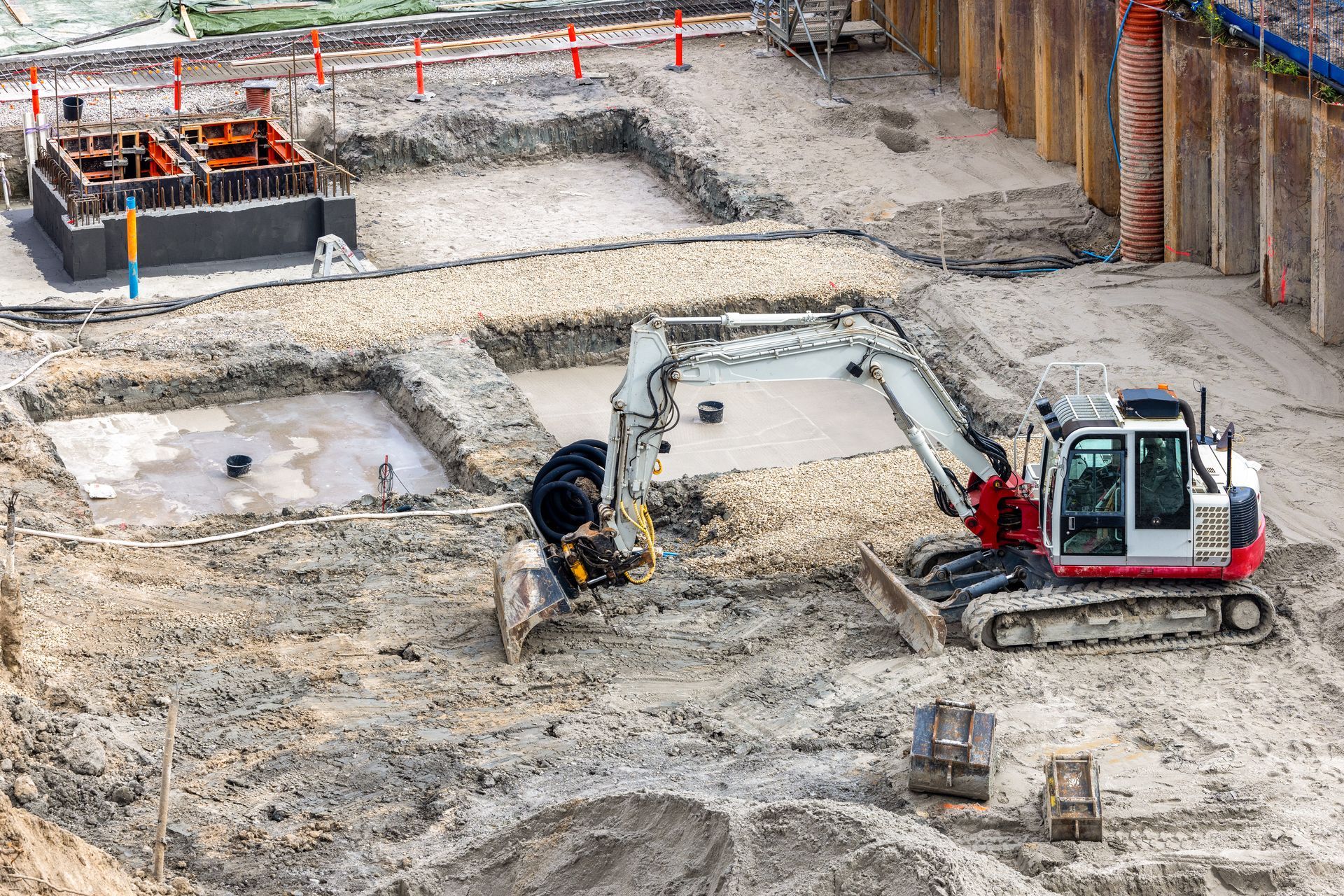 Civil contractors are using an excavator at the construction site. Civil contractors are using an excavator at the construction site.