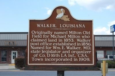 A sign that says walker louisiana originally named milton old field for michael milton who claimed land in 1853