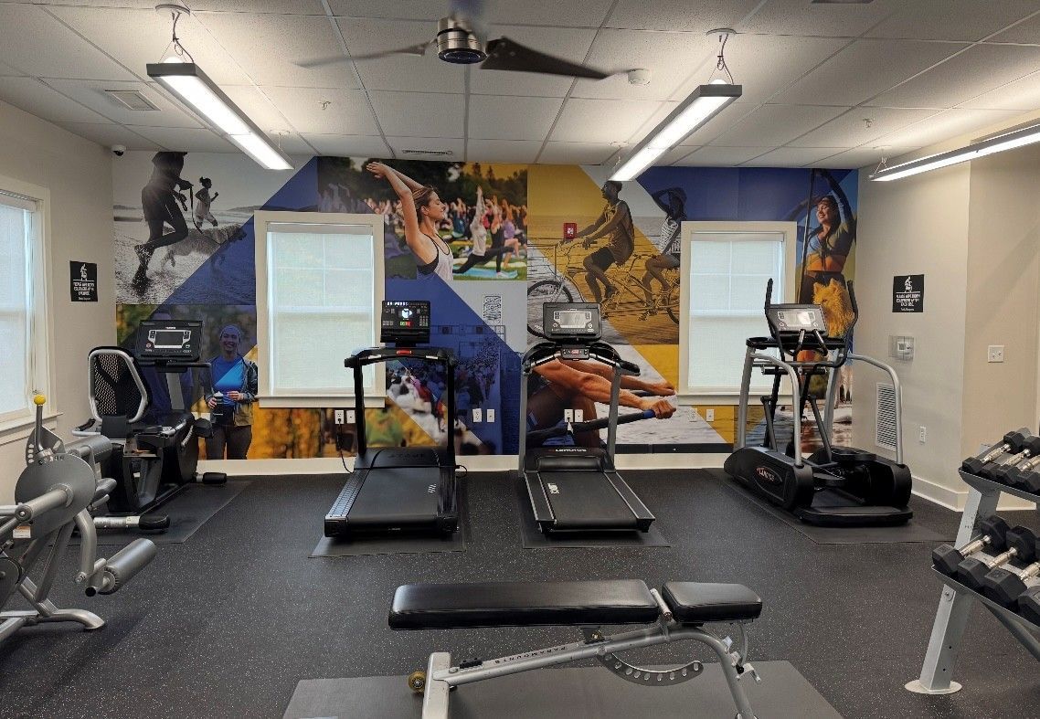 The Reserve at Stoney Creek fitness center with machines. 