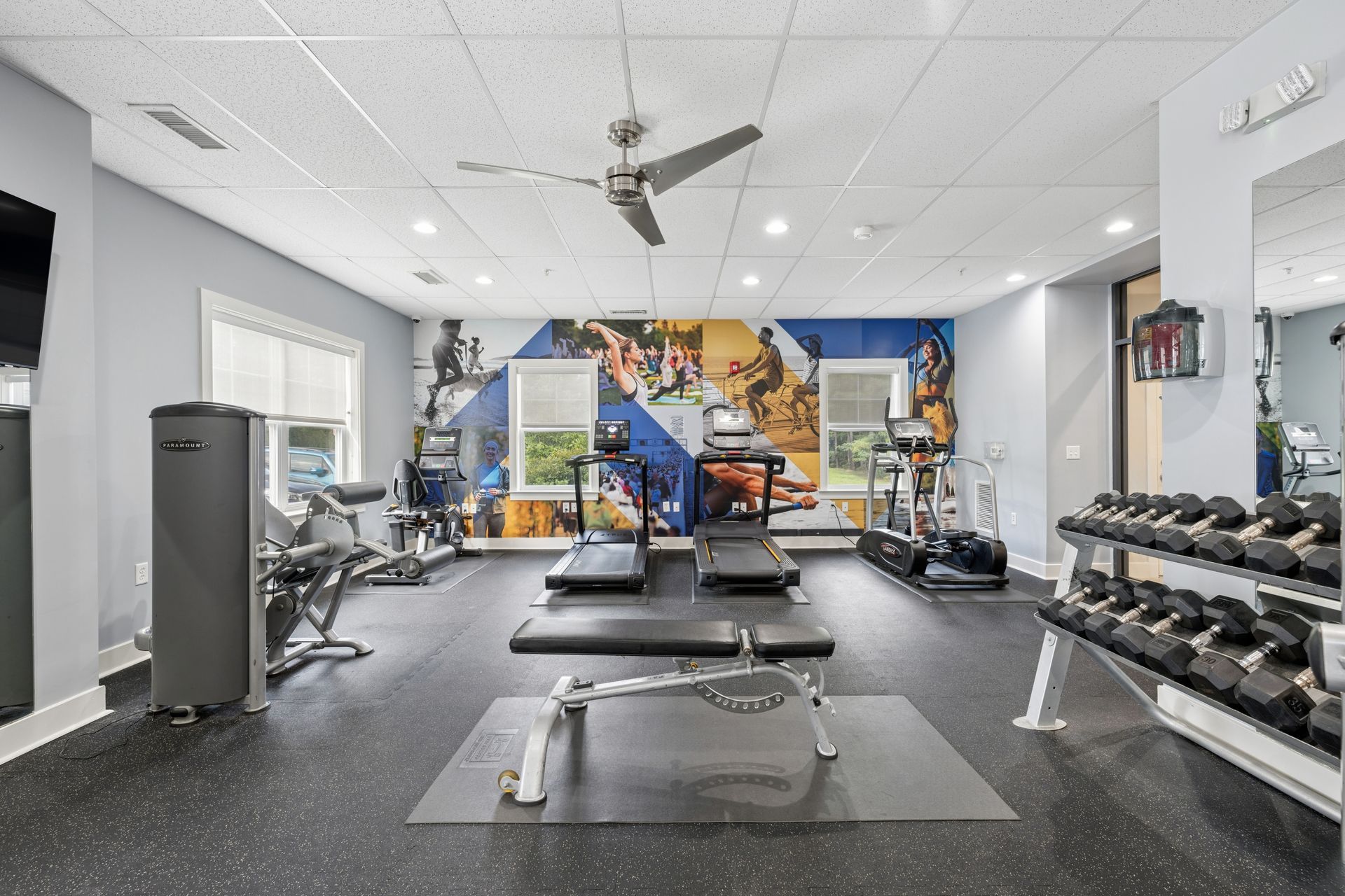 The Reserve at Stoney Creek fitness center with machines. 