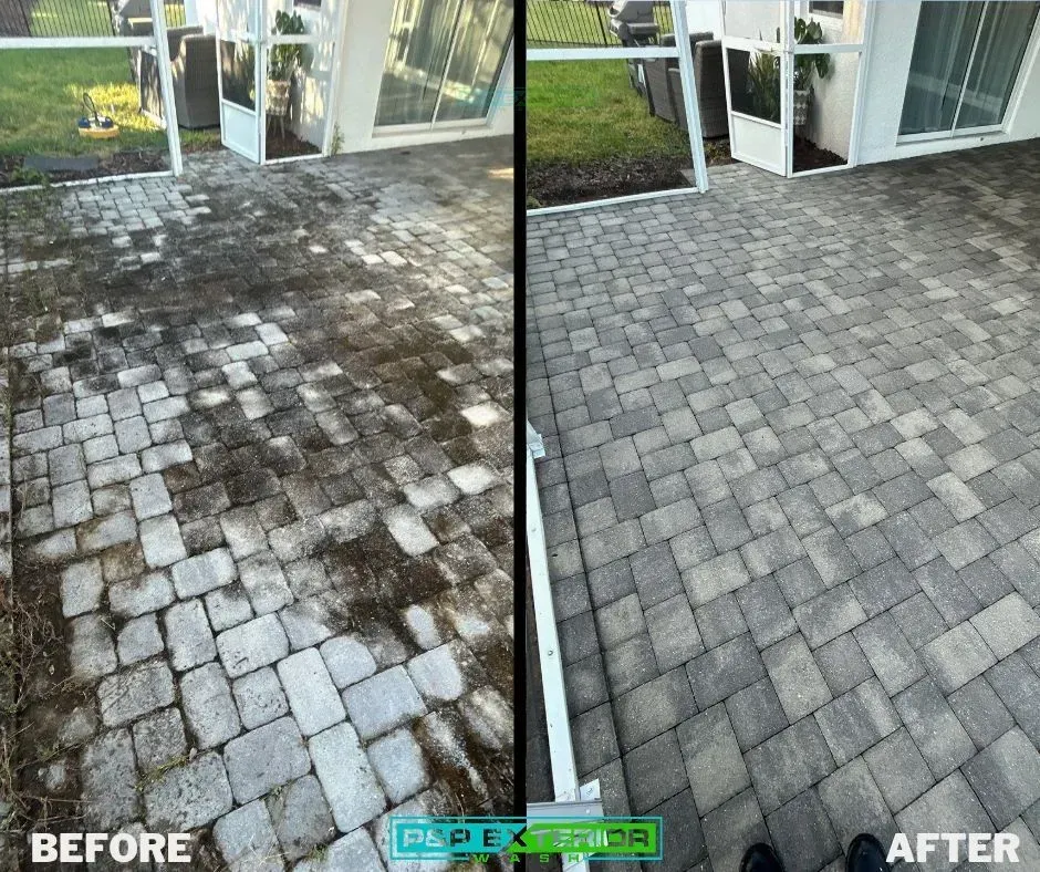 Before-and-after view of a cleaned gray paver patio, showing dark stains removed near a glass door.