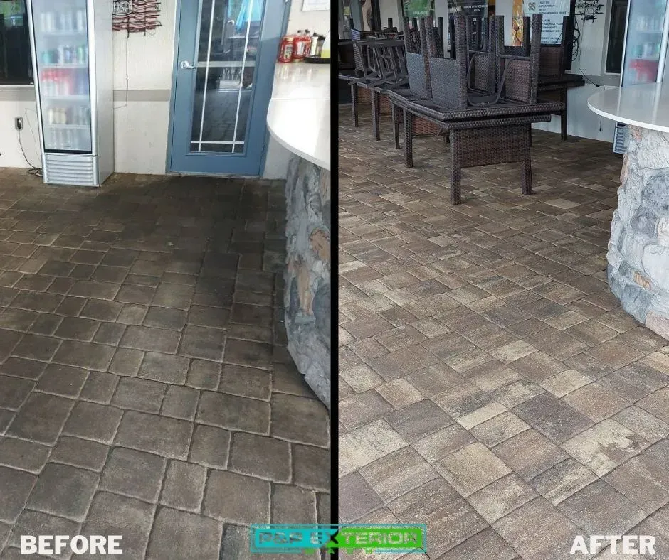Before-and-after patio paving: dark worn bricks replaced with lighter, cleaner pavers beside a restaurant entrance.