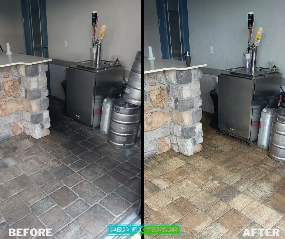 Before-and-after of a stone patio floor, changing from dark gray pavers to tan stone tiles.