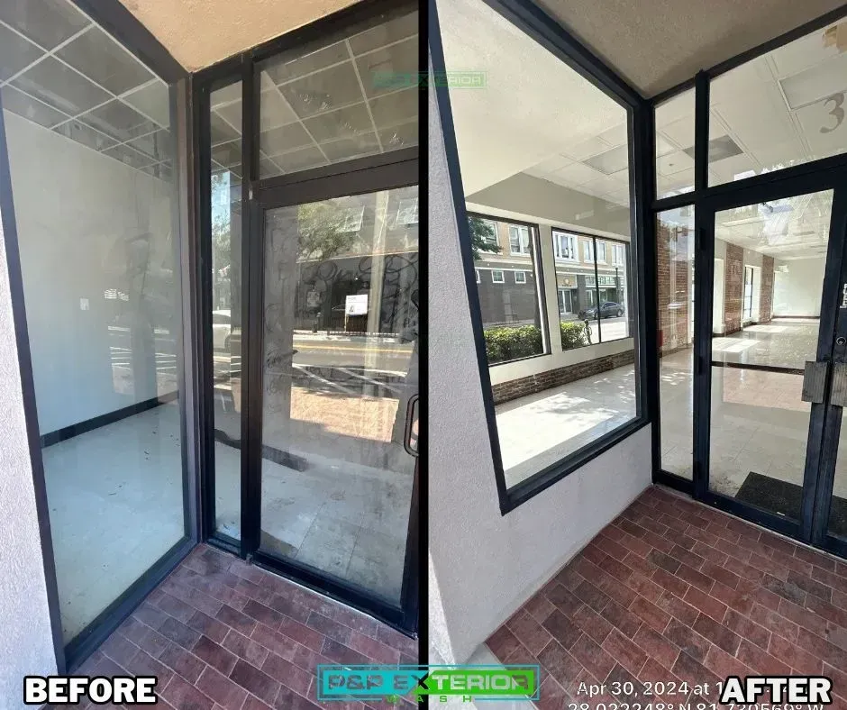 Before-and-after view of a glass storefront enclosure with black frames and red tile flooring.