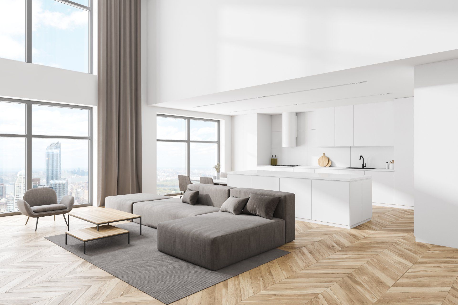 Espace de vie spacieux et moderne, blanc, avec un canapé sectionnel gris, une cuisine et de grandes fenêtres donnant sur un paysage urbain.