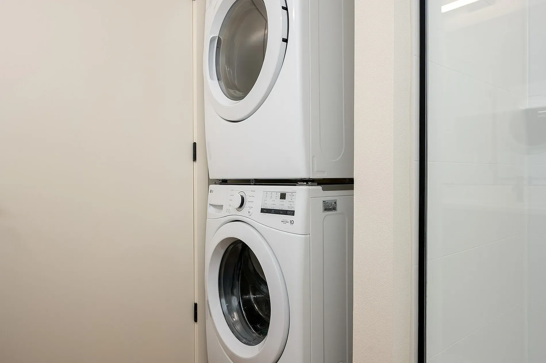 Stacked white LG washer and dryer