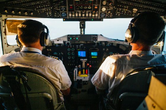 Business jet flight deck symbolizing operational control and aviation safety systems