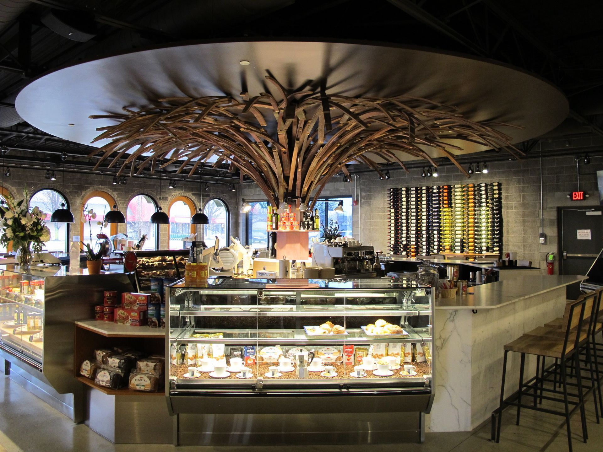 A restaurant with a tree in the middle of it