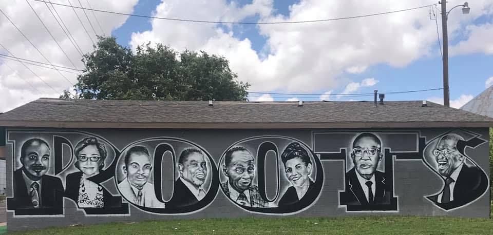 Mural of faces forming the word