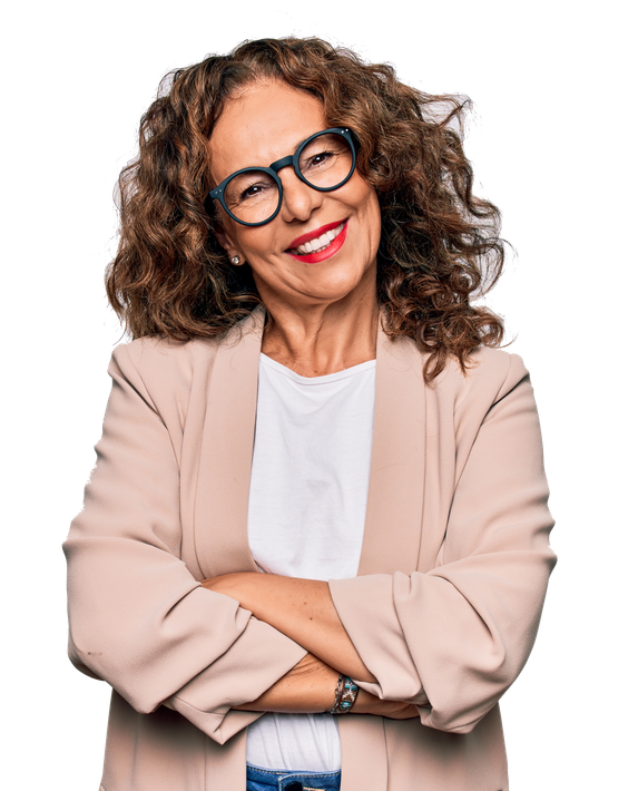 A woman wearing glasses and a jacket is smiling with her arms crossed.