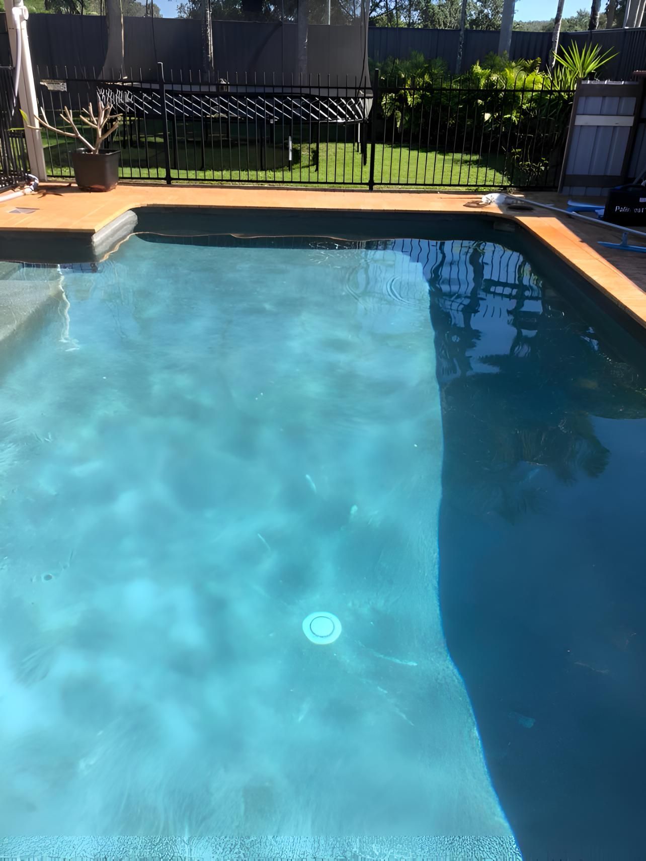 A Large Swimming Pool With Blue Water — Aqua Duck Pool Care In Buderim, QLD
