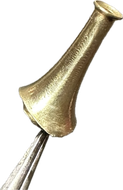 A close up of a brass object on a white background.