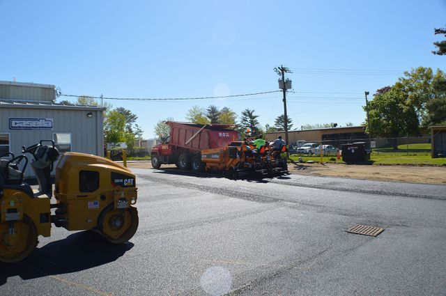 Rox Truck On Drive Way Installing Asphalt - Burlington, VT - Rox Asphalt