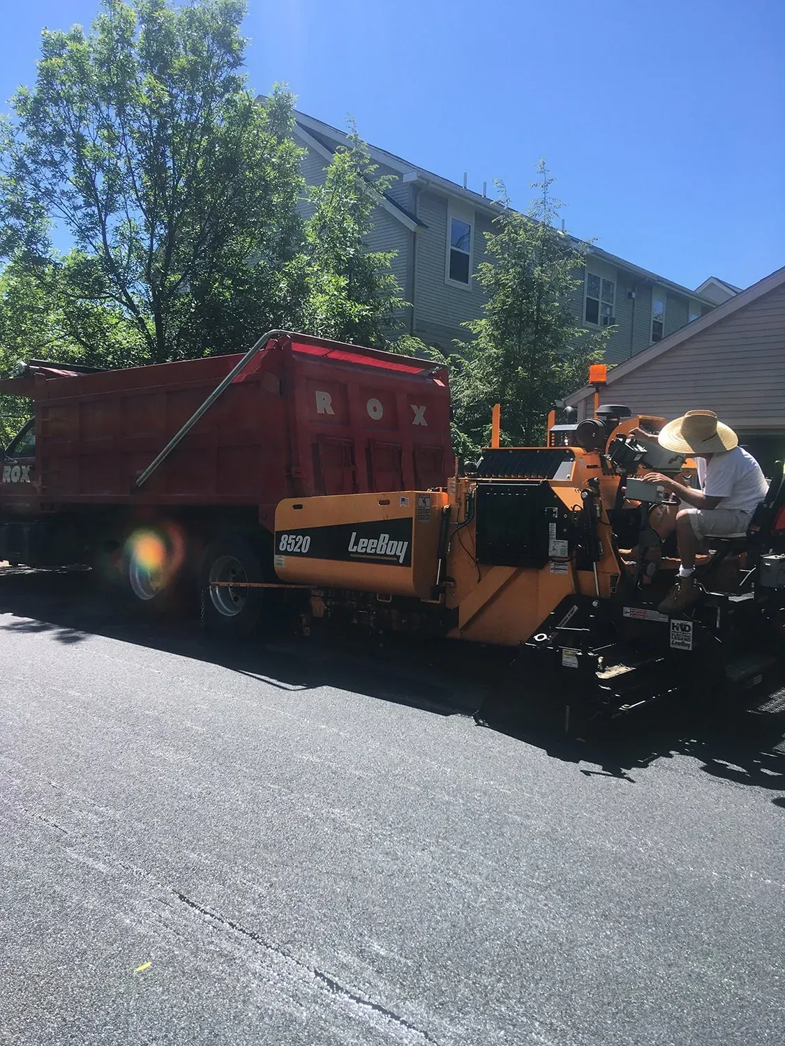 Man Paving Road - Burlington, VT - Rox Asphalt