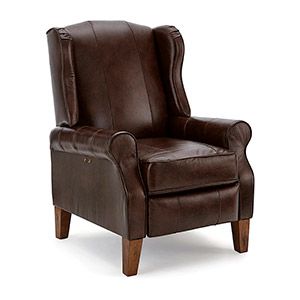 Brown leather armchair with wooden legs on a white background