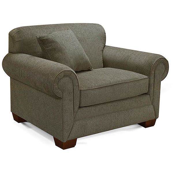 Gray upholstered armchair with rolled arms and a matching accent pillow