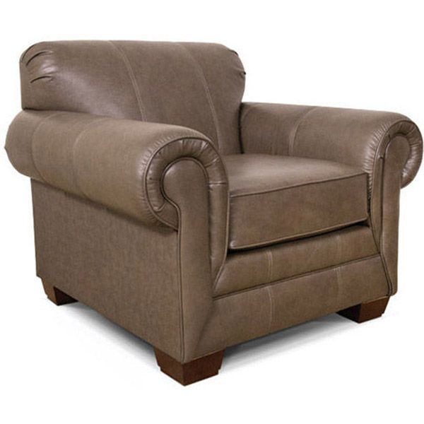 Brown leather armchair with rounded arms and wooden feet on a white background