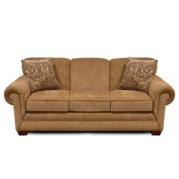 Tan upholstered sofa with rolled arms and patterned accent pillows on a white background