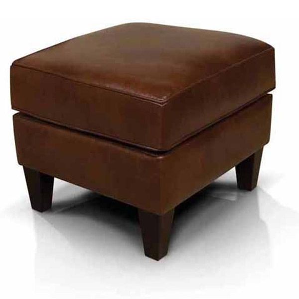 Brown leather ottoman with four wooden legs on a white background