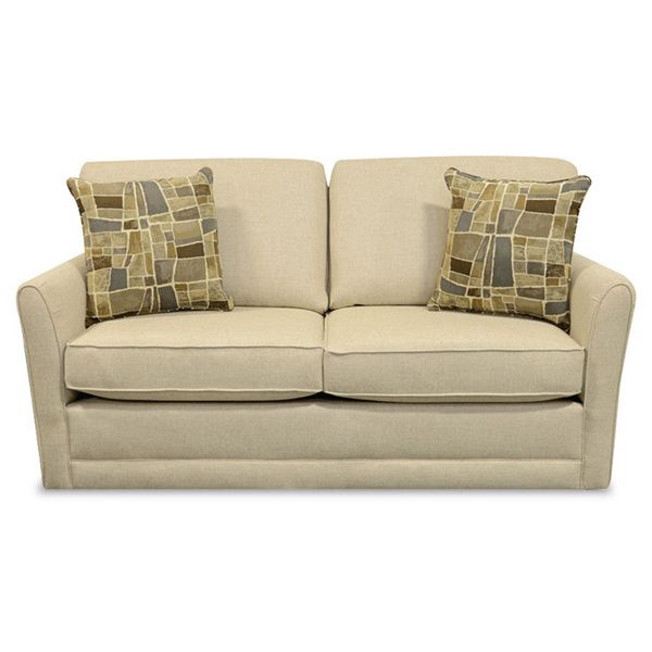 Beige loveseat with two patterned throw pillows on a white background
