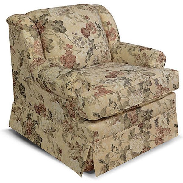 Floral-patterned upholstered armchair in beige and muted pink tones