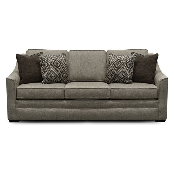 Gray three-seat sofa with patterned and dark throw pillows on a white background