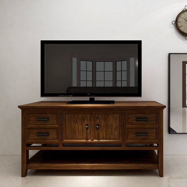 Dark wood TV console with flat-screen television in a minimalist room