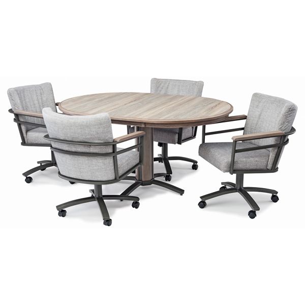 Round wooden conference table with four gray upholstered swivel chairs on wheels