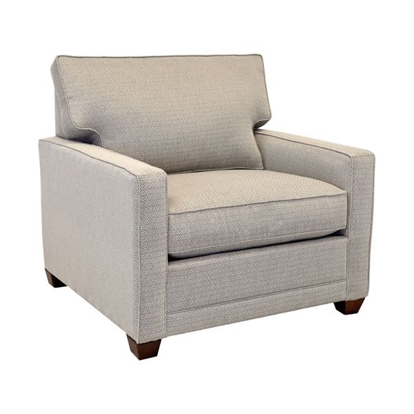 Light gray upholstered armchair with dark wooden legs on a white background